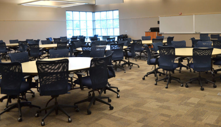 Room at WTC with round tables and chairs