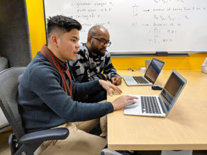 Two Deep Dive Coding Java and Android students working together.