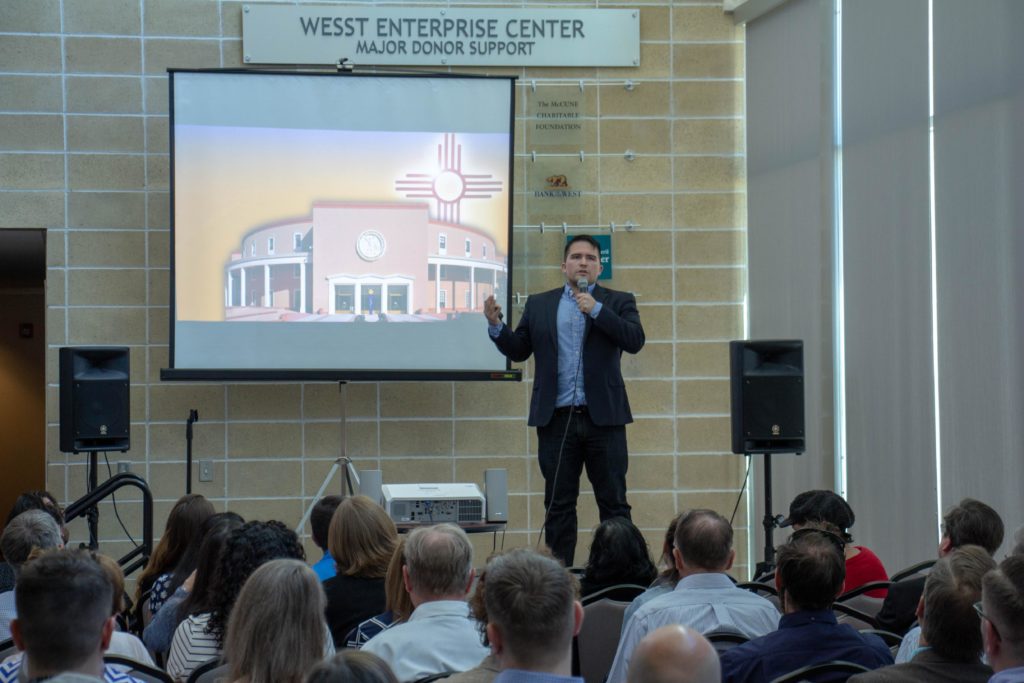 Young man presents his business at ActivateNM Demo Day.